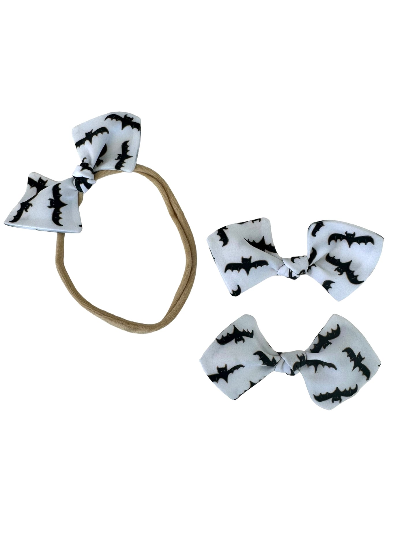 mini bat bows for pigtails and a nylon headband for babies