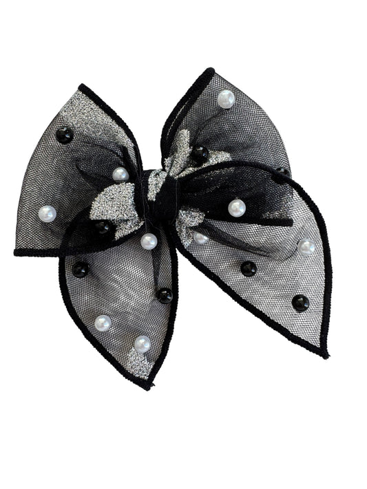 Black and silver bow with pearls on a white background