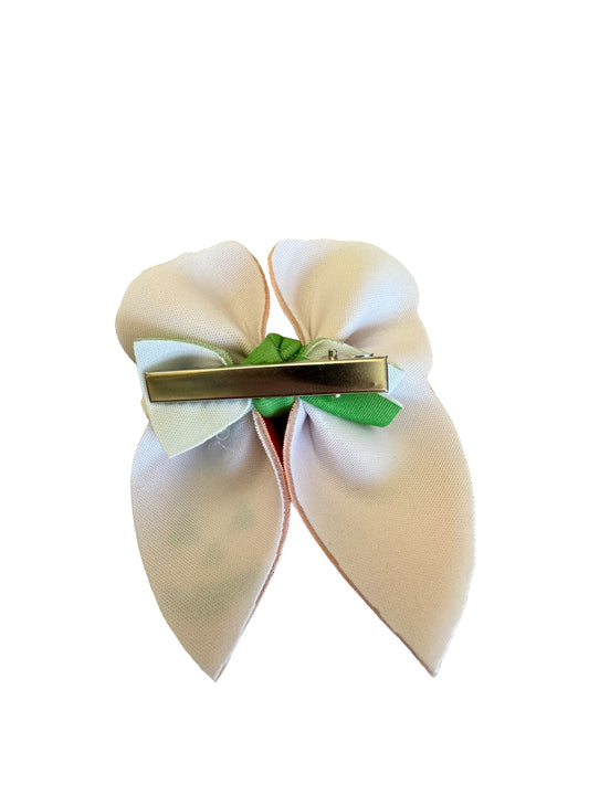 back of a hair bow with an alligator clip