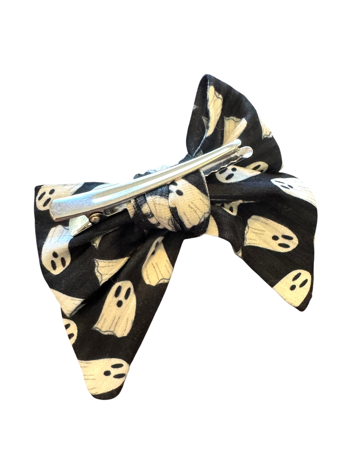 Black hair bow with ghost pattern on a white background