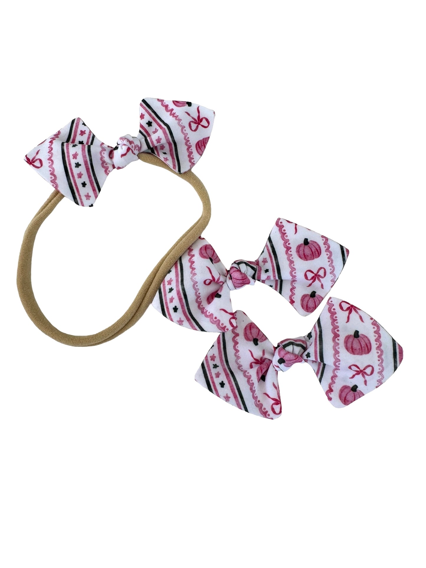 pink halloween mini bows for pigtails and a baby headband