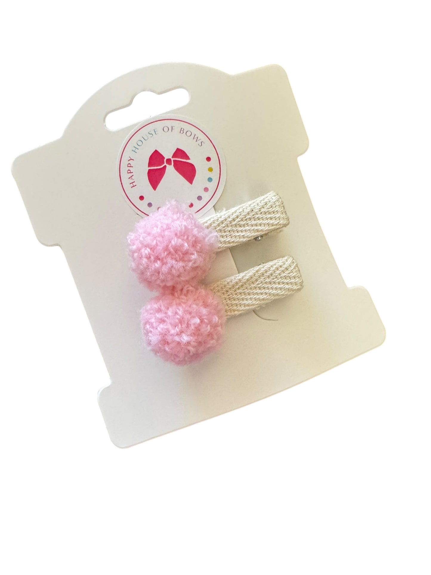 Set of pink pom-pom hair clips on a branded card with 'Happy Hair Bows' logo.