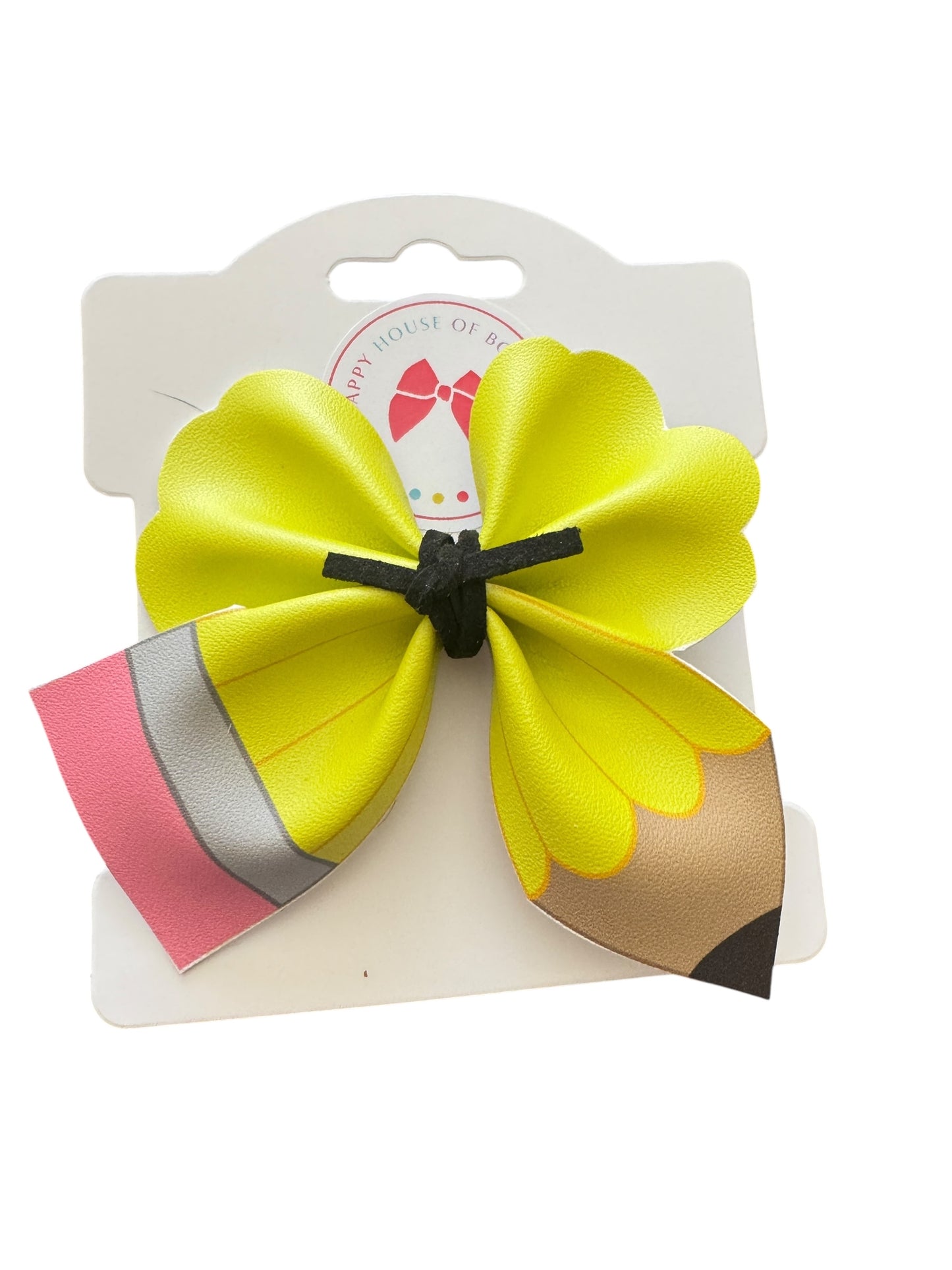 Yellow pencil hair clips on a white background