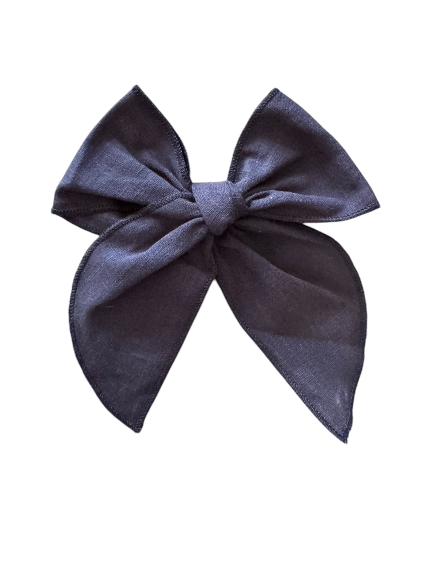Navy blue hair boww attached to an alligator clip.
