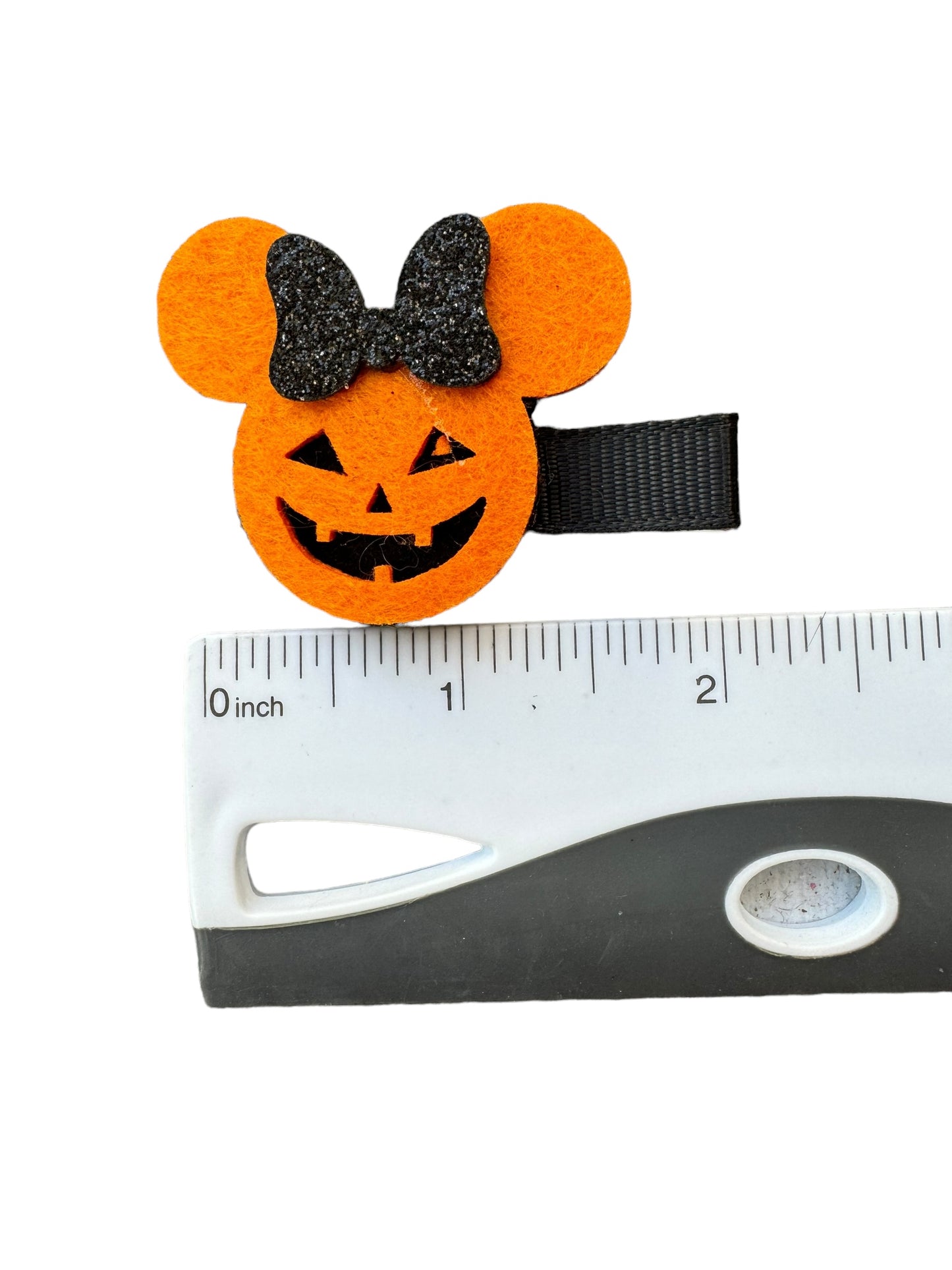 Halloween pumpkin mouse hair clip with a black glitter bow with a ruler