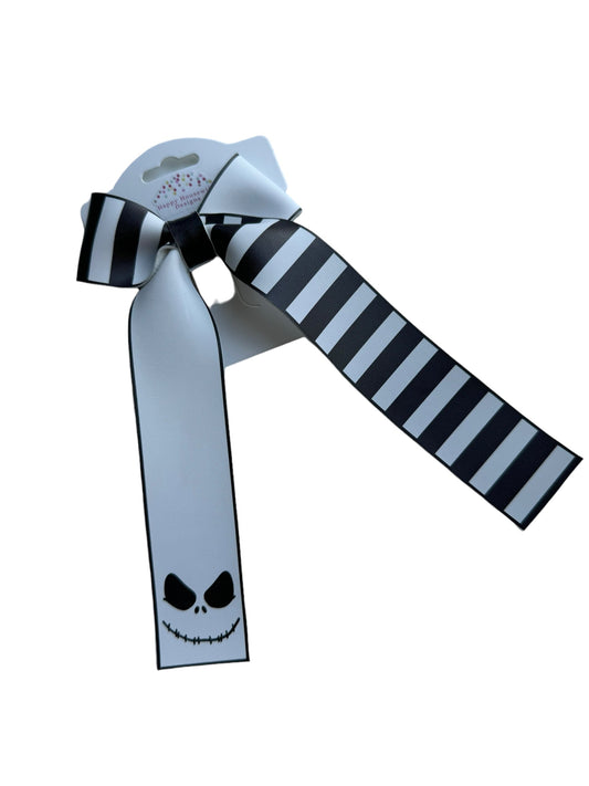 skeleton and striped hair bow