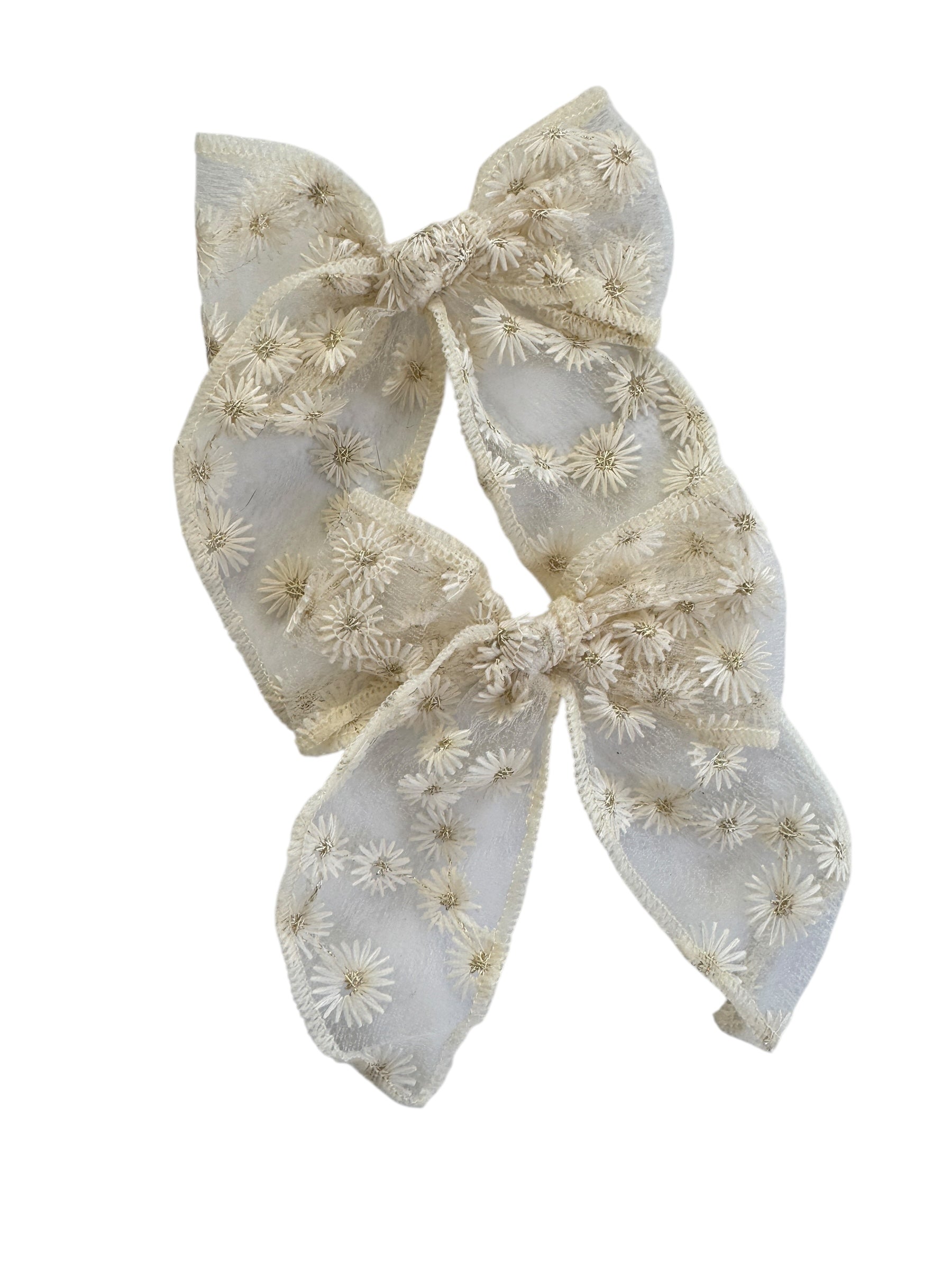 Floral patterned bow on a white background