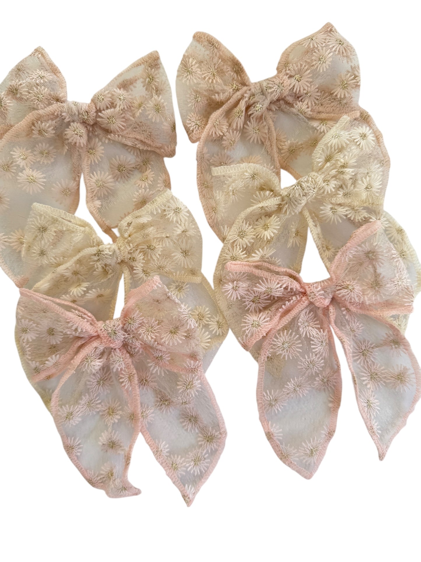 Set of decorative bows with floral patterns on a white background