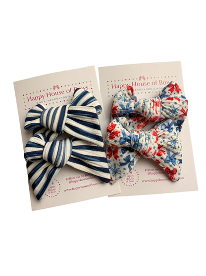 Two fabric bows on a card with 'Happy House of Bows' branding.