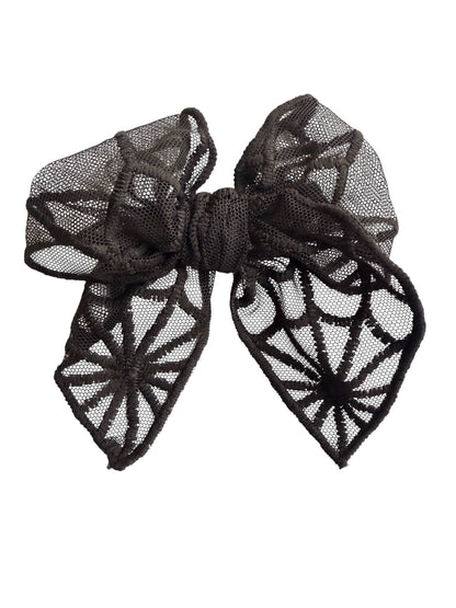 A black sheer mesh bow with intricate lace cutout patterns, displayed against a solid white background.