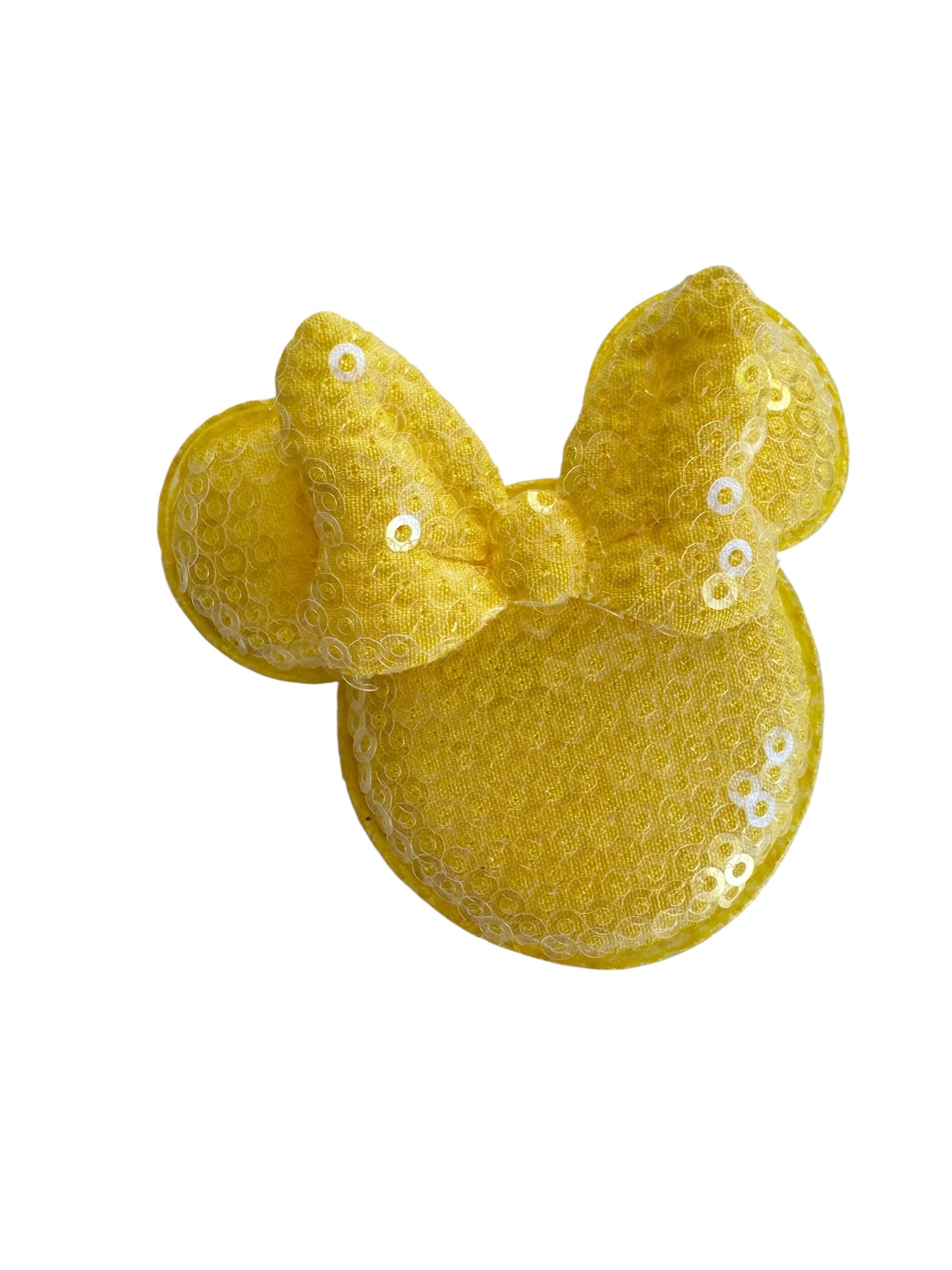 Yellow sequin minnie bow on a white background