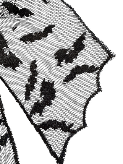 Black bat patterns on a sheer black fabric background