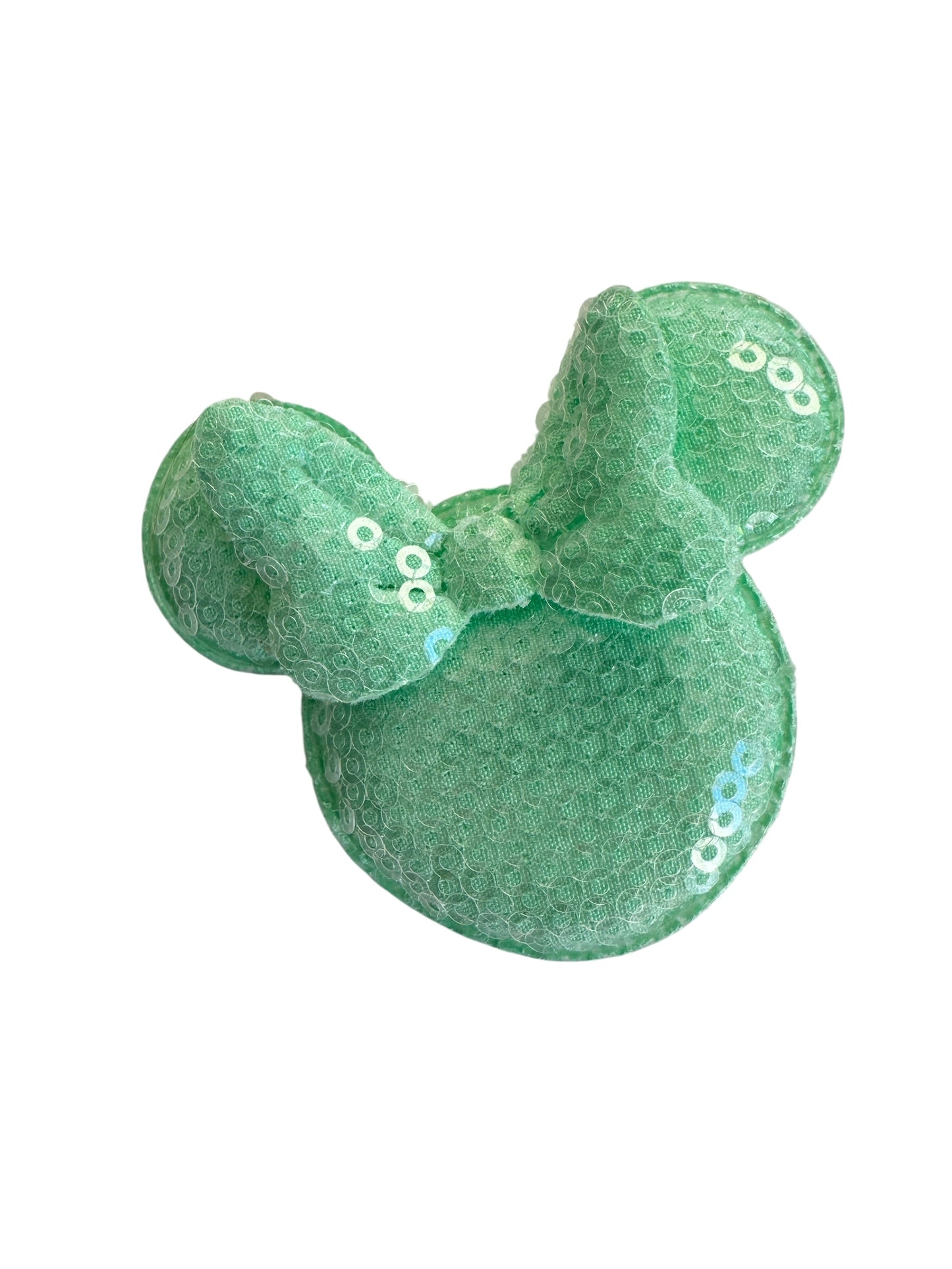 Green sequined minnie bow on a white background