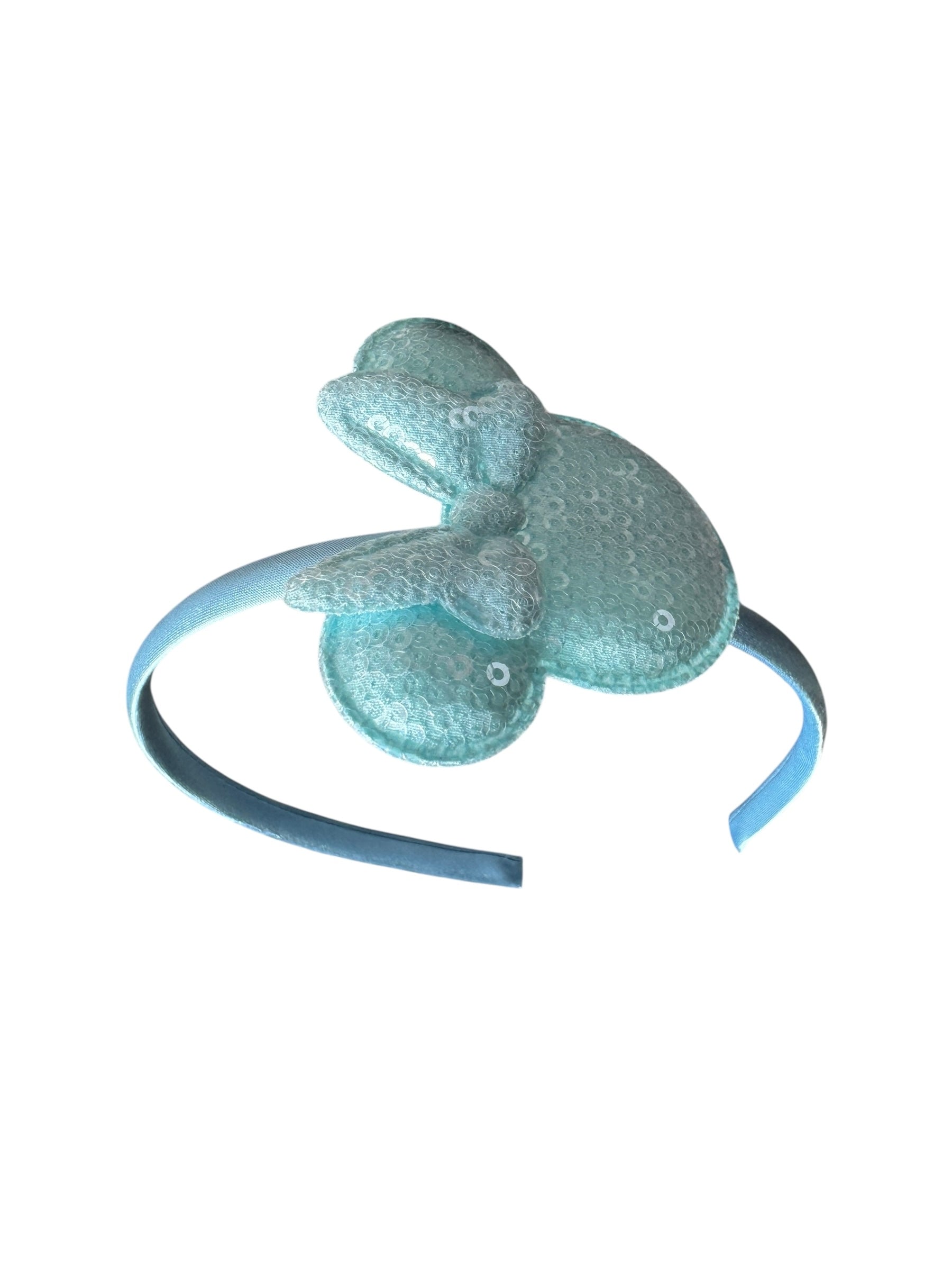 Light blue headband with frog-shaped decorations on a white background