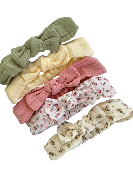 Set of colorful headbands with floral patterns on a white background