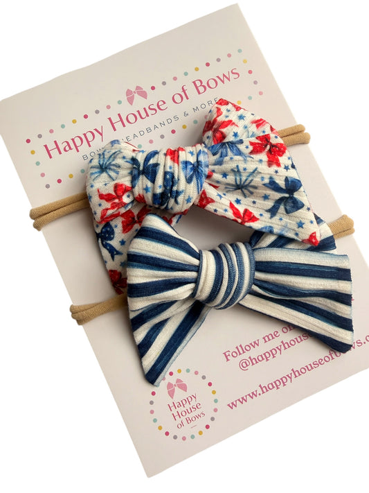 Two bow-shaped headbands on a card with 'Happy House of Bows' branding.
