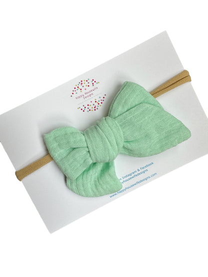 *Solid Muslin Hair Bows on Nylon Headband