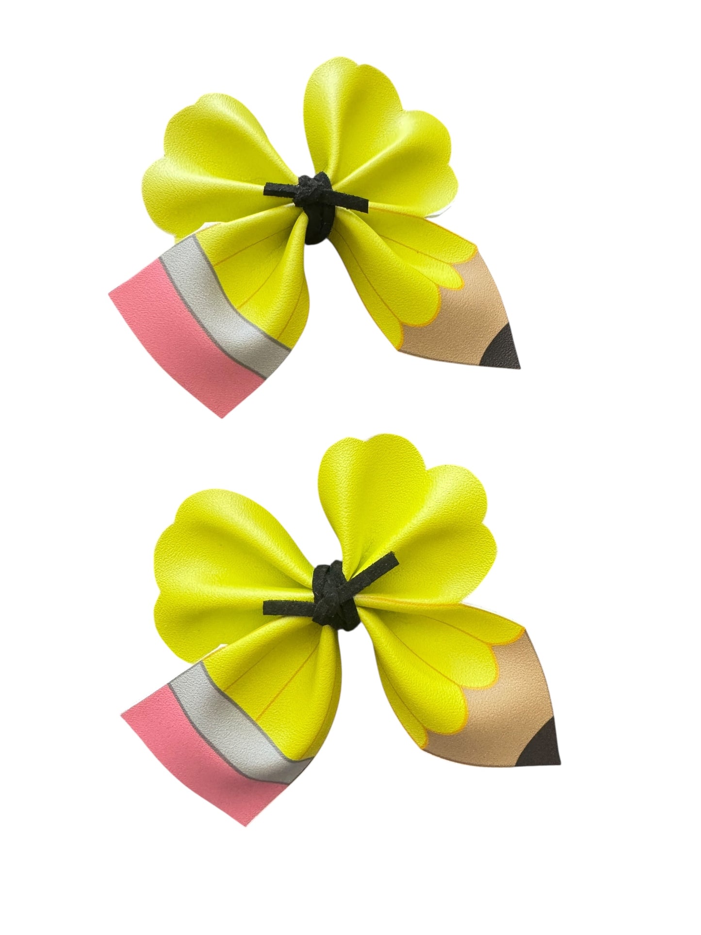  2 Yellow pencil hair clips on a white background