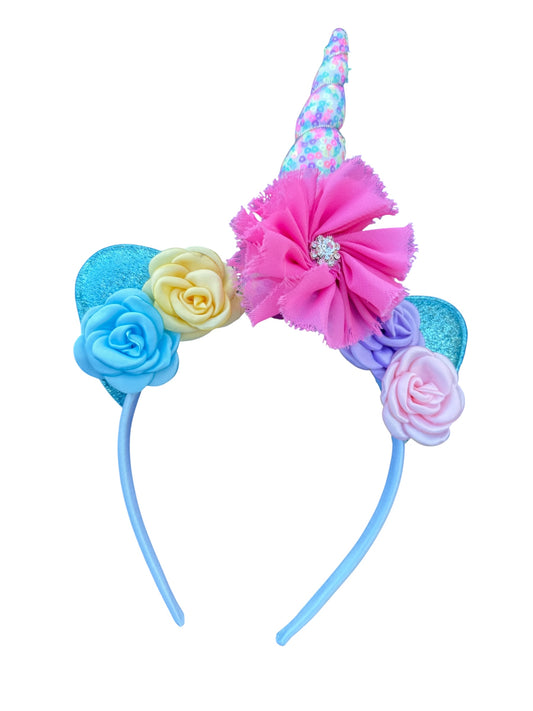 Colorful unicorn headband with flowers on a white background