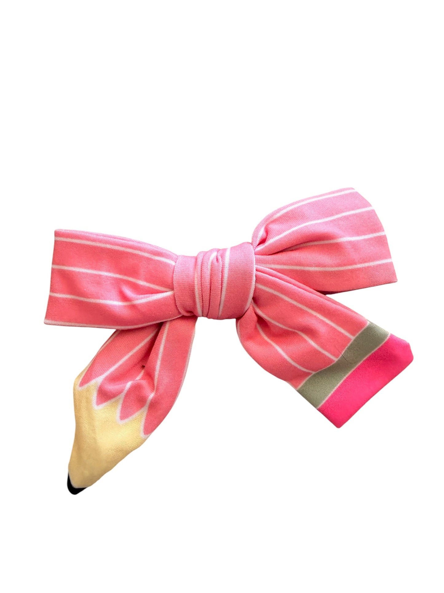A pink fabric hair bow with white stripes and a pencil tip design, shown on a plain white background.