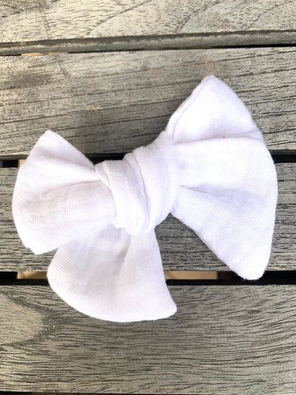 *Solid Muslin Hair Bows on Nylon Headband