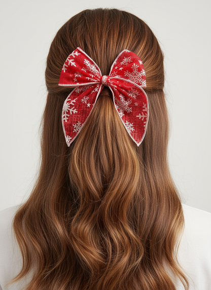 Red snowflake bow on half-up half-down hairstyle