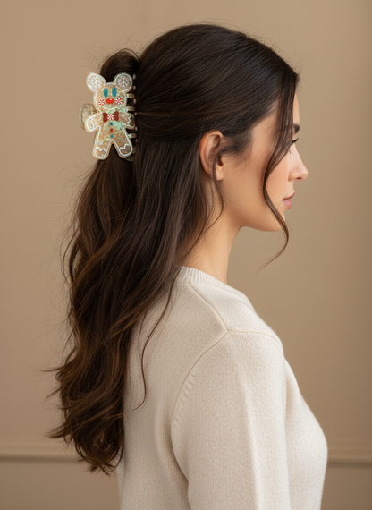 Side lifestyle image of woman wearing gingerbread claw clip facing right