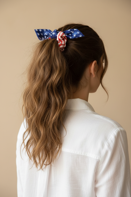 Woman with scrunchie in high ponytail, back view