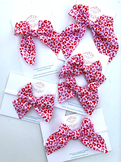 *Red and Pink Leopard Hair Bows